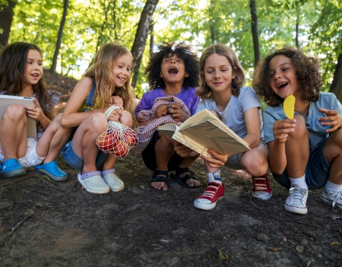 full-shot-smiley-kids-forest